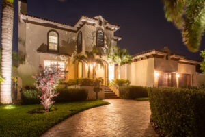Our goal for our customer was to showcase the home's elegant design, with lighting that highlights its stately features and lush landscaping for a breathtaking nighttime display.